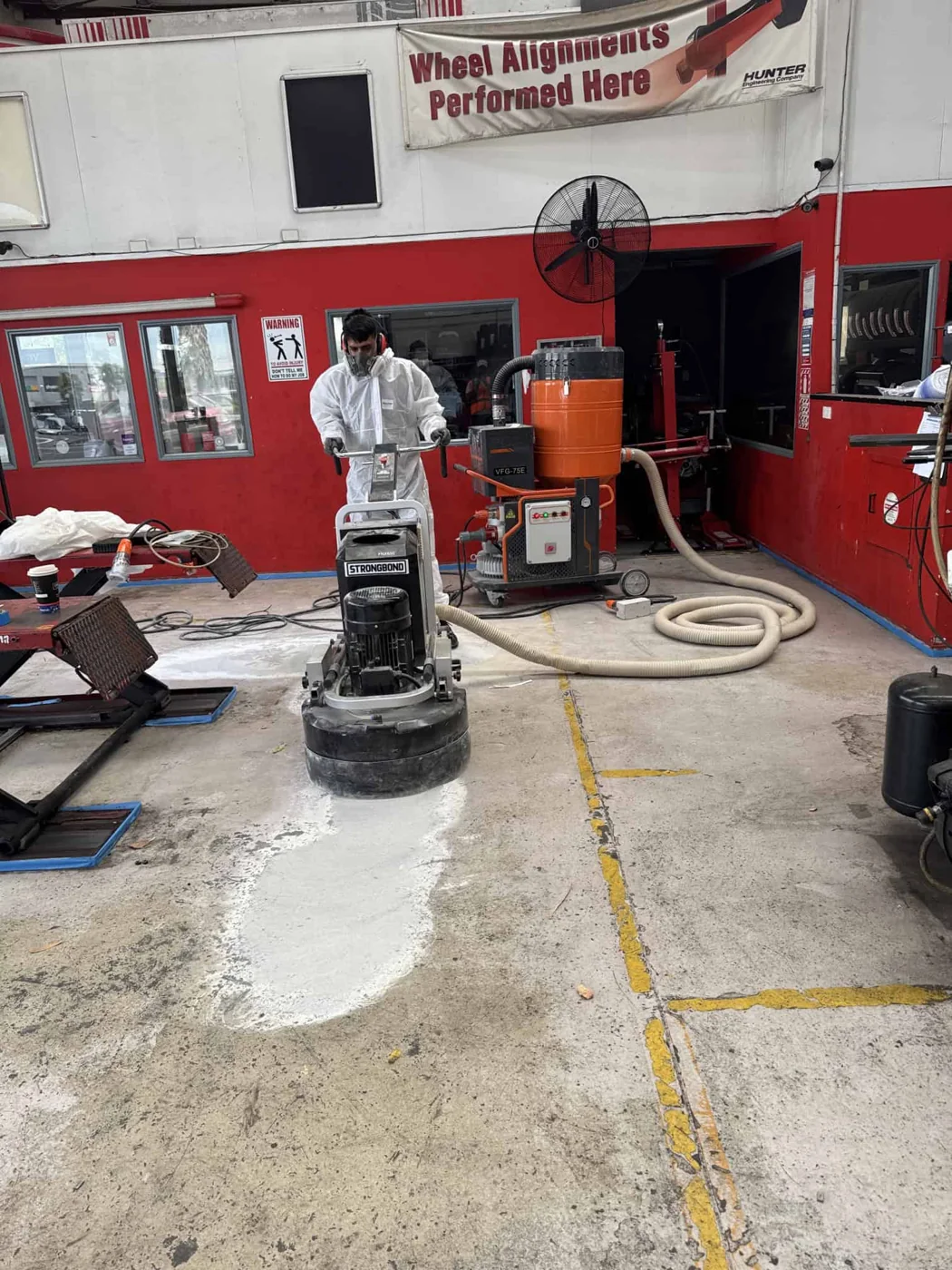 FlooringPro concrete grinding equipment preparing an Auckland slab